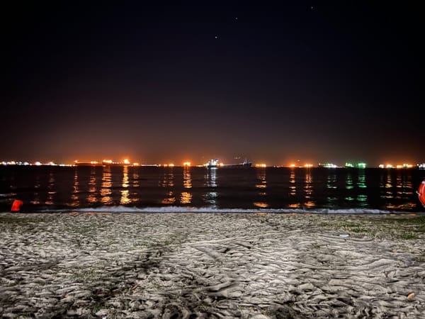 waves night light sand 